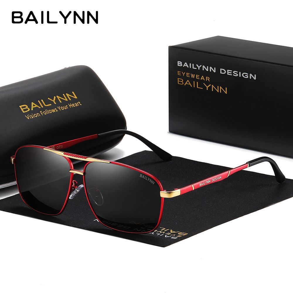 Red and gold frame Polarized Aviator Sunglasses displayed on branded cloth