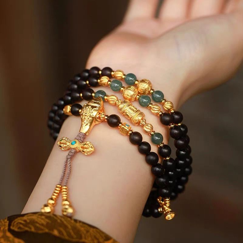 Multi wrap natural agarwood mala bracelet stack with ancient sand gold beads and vajra charm