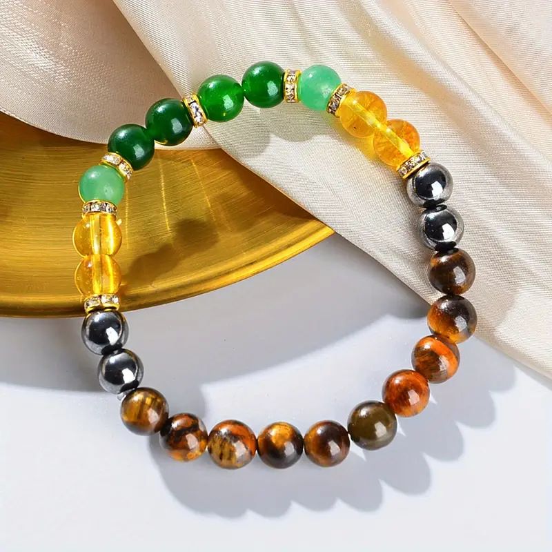 Handcrafted Wealth Manifestation Bracelet featuring polished natural Citrine Tiger Eye and Hematite beads on white silk