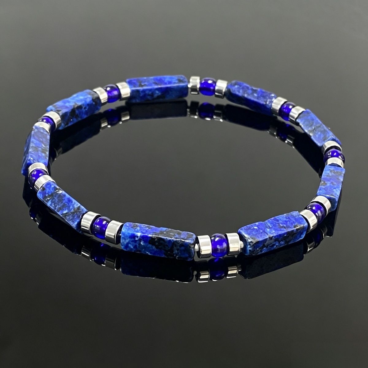 Lapis Lazuli Bracelet flat lay on reflective black surface