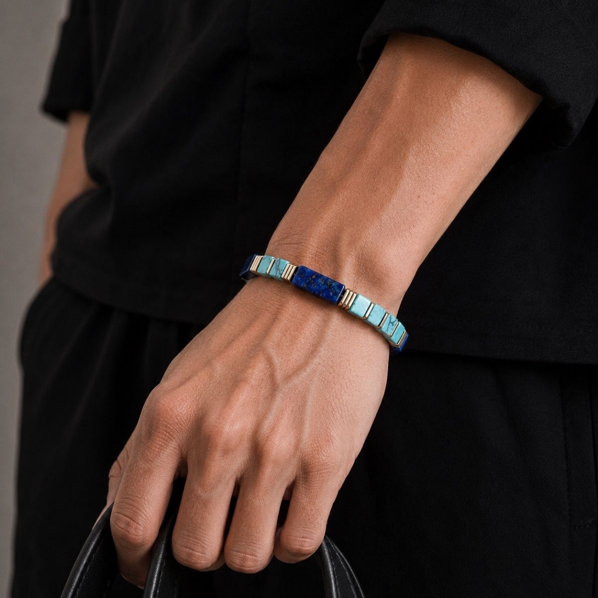 Men wearing geometric Lapis Lazuli Bracelet with black outfit
